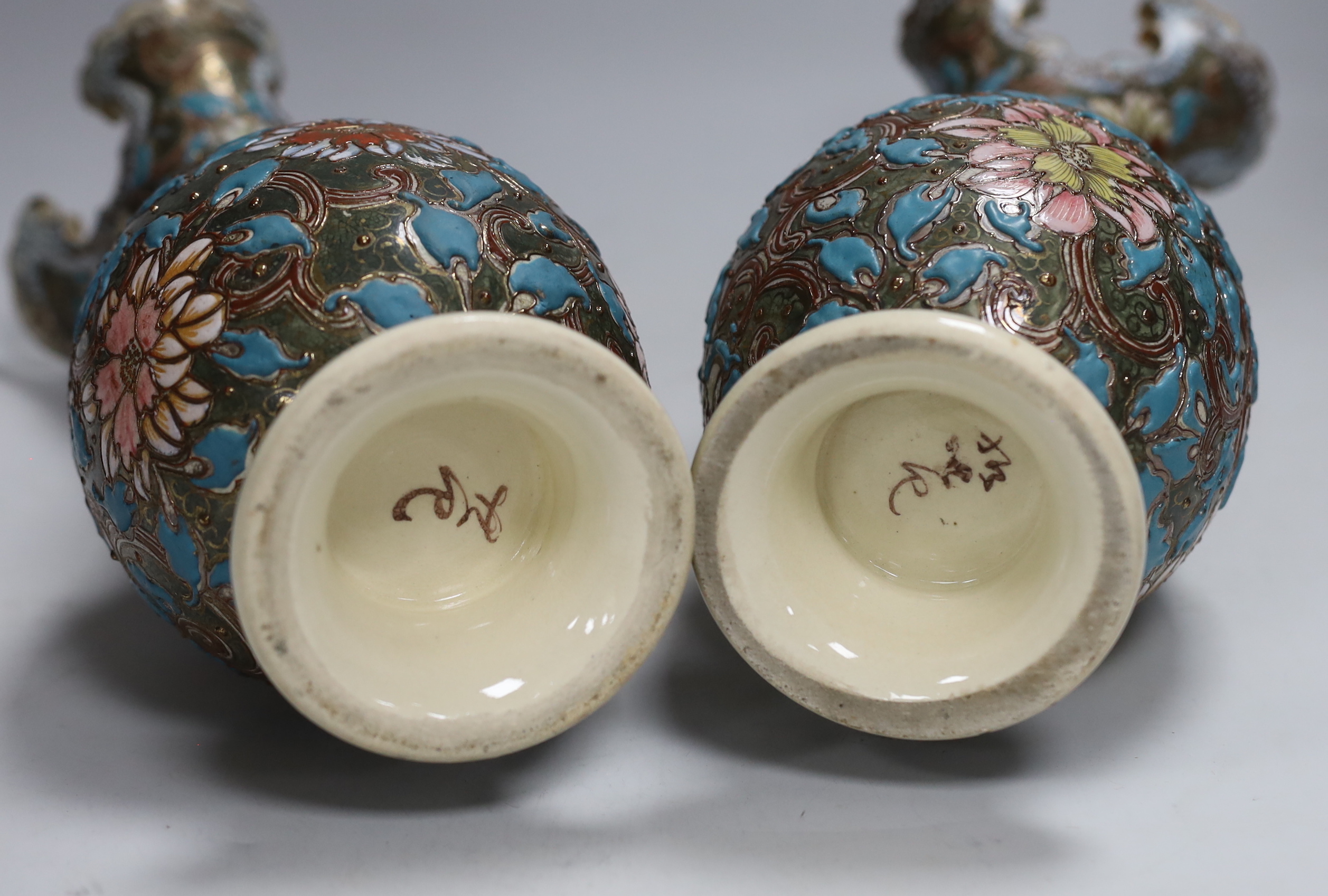 A pair of Japanese moriage pottery vases, 30cm high